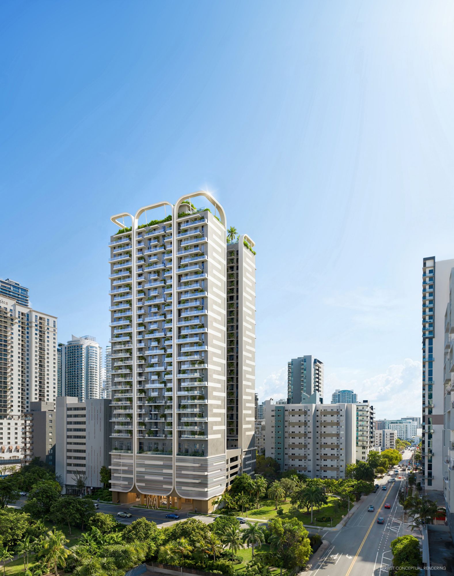 Vista diurna de la torre House of Wellness entre los edificios de Brickell, con vegetación en cada balcón