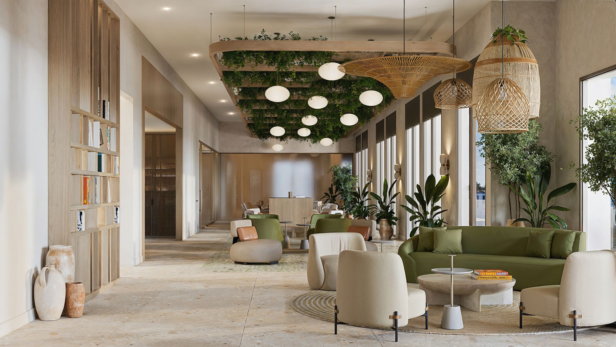 Lounge del lobby de Parkside con sofás verdes, biblioteca de madera, lámparas de mimbre y plantas colgantes